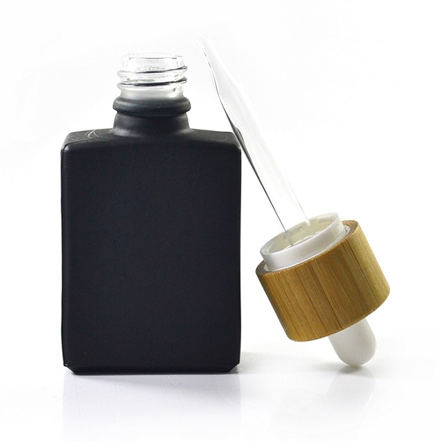 Tropfflasche aus Glas mit Bambusdeckel