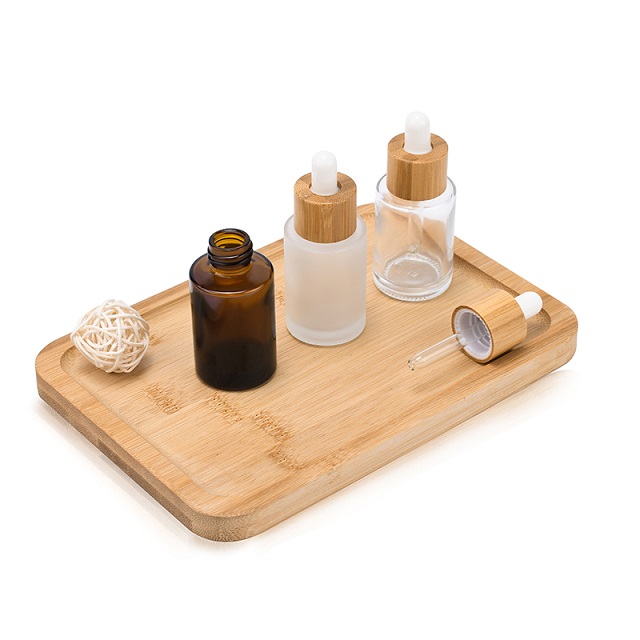 주문 로고 100ml 무광택 유리 화장품 포장 15ml 20ml 30ml 50ml 대나무 점적기 모자를 가진 둥근 유리제 머리 얼굴 정유 병