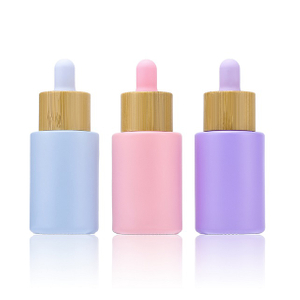 Aangepast logo 100 ml matte glazen cosmetische verpakkingen 15 ml 20 ml 30 ml 50 ml ronde glazen haargezicht etherische olieflessen met bamboe druppeldop