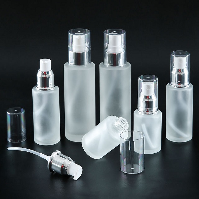 El hombro plano cosm&eacute;tico 30ml 50ml 100ml esmeril&oacute; la botella de cristal clara para el aceite del reflejo del resplandor del cuerpo de la cara