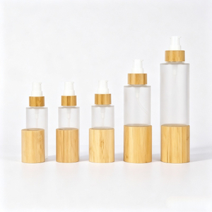 Luxe 30 ml 50 ml 100 ml lege huidverzorgingslotion cr&egrave;me glasspray ronde matte heldere cosmetische flesverpakking met bamboe pompdeksel