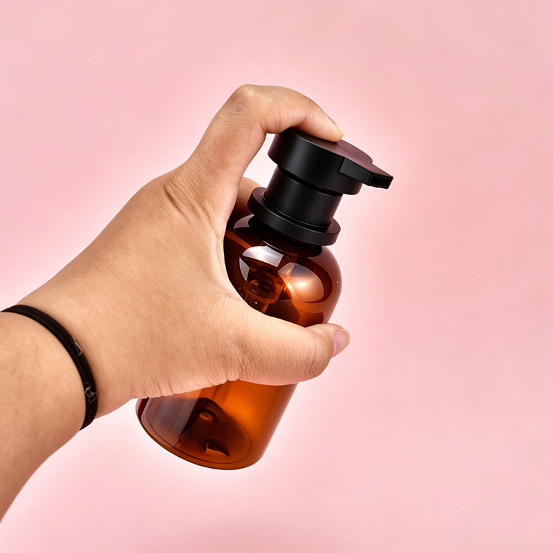 Amberkleurige lotionfles