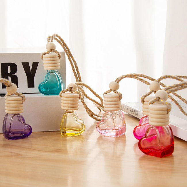 Bouteille de diffuseur de liquide vide en forme de cœur, bouteille suspendue color&eacute;e pour d&eacute;sodorisant de voiture, vente en gros